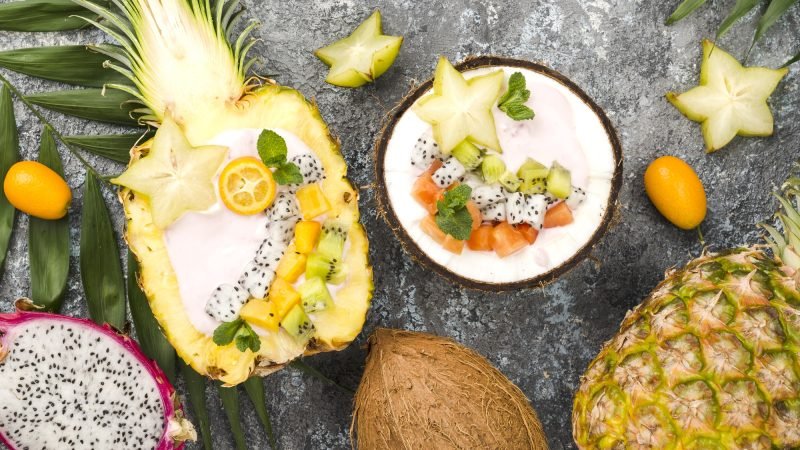 fruit-salad-coconut-pineapple-plates-top-view